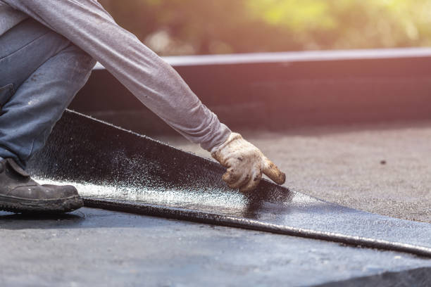 Professional Emergency Waterproofing technician working in Hamilton, IL